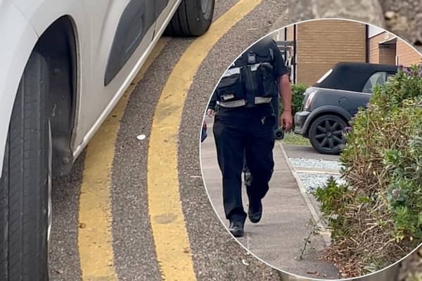 Traffic warden's car spotted parked on double yellow line while writing up tickets in Whitstable, Kent. 