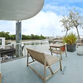 The houseboat is moored by Lightermans Walk, Wandsworth