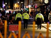 Police partrol Soho at night during the time of Covid restrictions 