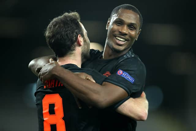 Ighalo  celebrating with Juan Mata (Photo by UEFA - Handout/UEFA via Getty Images )