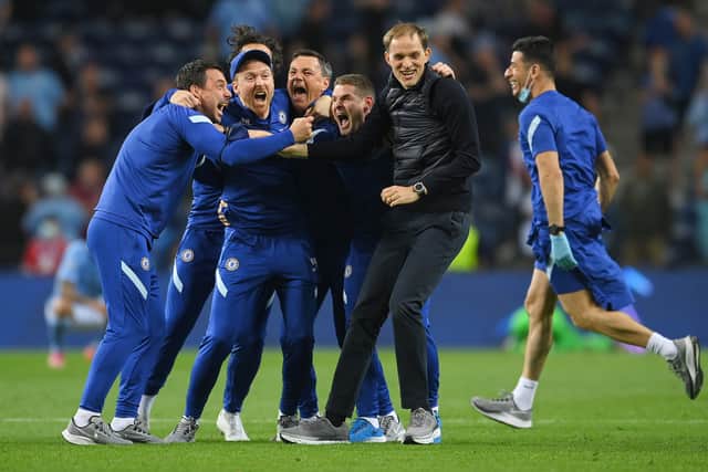 Chelsea manager Thomas Tuchel celebrating with his players (Photo by David Ramos/Getty Images)