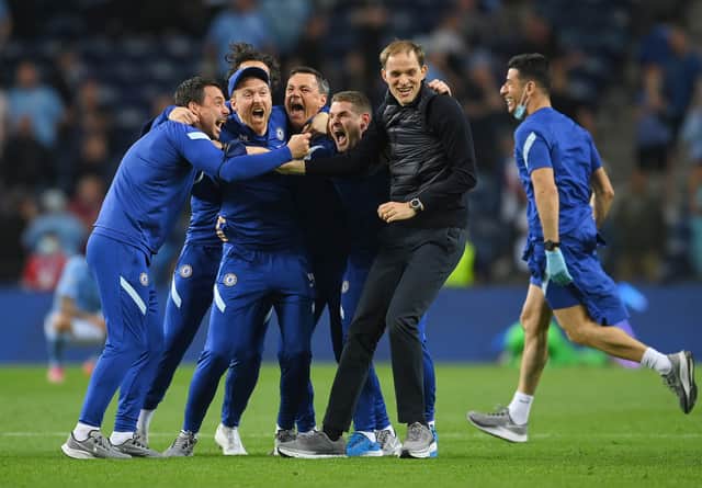 Chelsea manager Thomas Tuchel celebrating with his players (Photo by David Ramos/Getty Images)