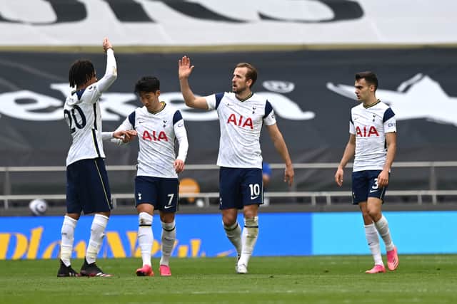 Tottenham Hotspur players celebrate after a goal (Photo by Shaun Botterill/Getty Images)
