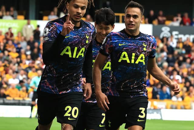 Dele Alli of Tottenham Hotspur celebrates with his team mates after scoring his first of the season (Photo by David Rogers/Getty Images)