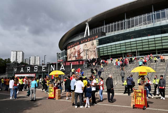 <p>Fans outside the Emirates Stadium (Photo by Shaun Botterill/Getty Images)</p>