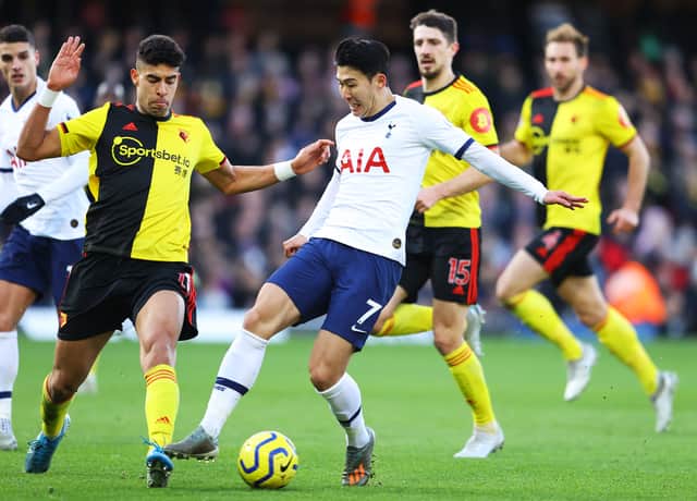 Heung-min Son of Tottenham Hotspur tackles with Adam Masina (Photo by Richard Heathcote/Getty Images)