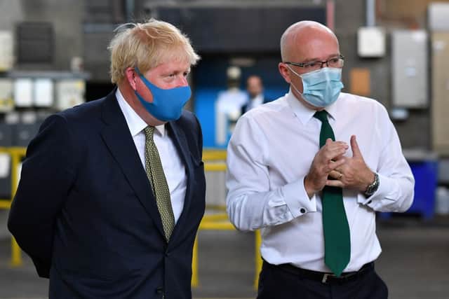 Garrett Emmerson, right, with Boris Johnson, when in post as chief executive of the London Ambulance Service. Credit: Ben Stansall-WPA Pool/Getty Images