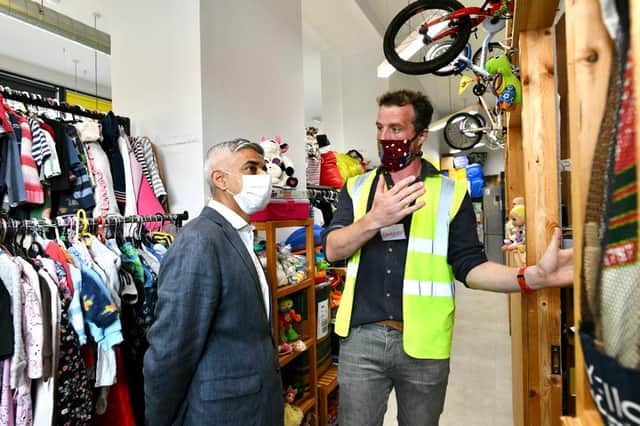 Lawrence Smith shows Sadiq Khan around the Lewisham Donation Hub. Credit: Mayor of London.