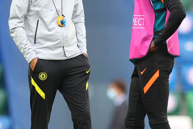 Thomas Tuchel, Manager of Chelsea speaks with Antonio Ruediger of Chelsea during a Chelsea FC (Photo by Catherine Ivill/Getty Images)