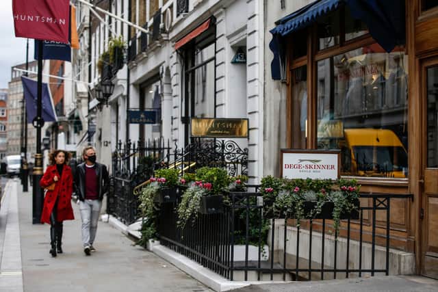 Savile Row, the famous tailoring street in Mayfair. The Huntsman cutting house, where Kimberley Lawton did her apprenticeship can be seen. This is also where Daisy Knatchbull’s The Deck has opened, and is the first shopfront on the street exclusively for women. Photo by Hollie Adams/Getty Images
