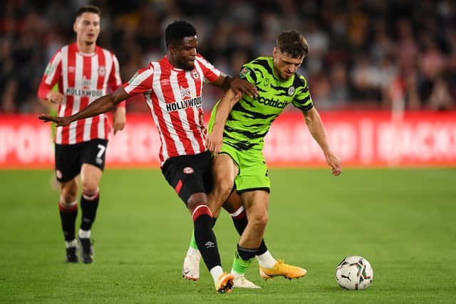 Frank Onyeka of Brentford tackles Josh March of Forest Green Rovers (Photo by Justin Setterfield/Getty Images)