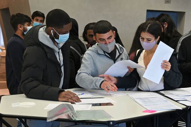 Students in Tottenham received their A-Level results in masks. Credit: JUSTIN TALLIS/AFP via Getty Images