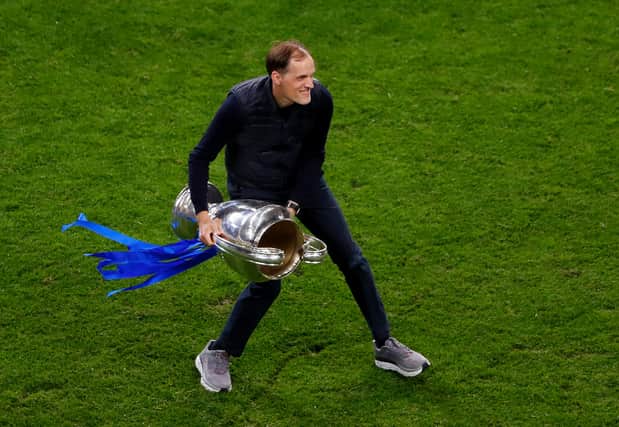 Thomas Tuchel, Manager of Chelsea celebrates with the Champions League Trophy (Photo by Susan Vera - Pool/Getty Images)