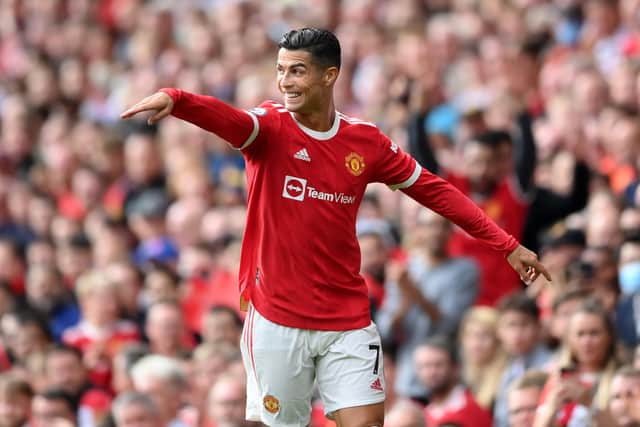 Cristiano Ronaldo of Manchester United smiles during the Premier League match (Photo by Laurence Griffiths/Getty Images)