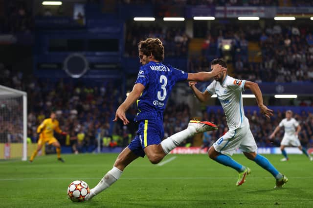 Marcos Alonso of Chelsea crosses the ball during the UEFA Champions League group (Photo by Clive Rose/Getty Images)