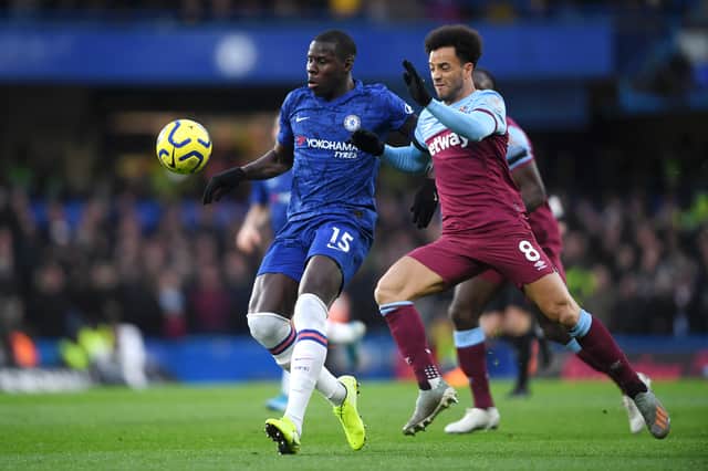 Kurt Zouma of Chelsea is challenged by Felipe Anderson of West Ham United  (Photo by Mike Hewitt/Getty Images)