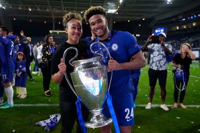 Reece James of Chelsea celebrates with the Champions League Trophy with his Sister, Lauren James (Photo by Manu Fernandez - Pool/Getty Images)
