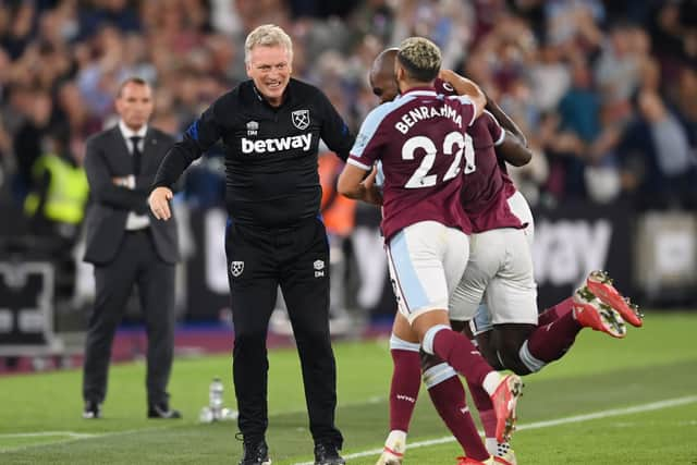 Michail Antonio of West Ham United  celebrates with David Moyes, Photo by Michael Regan/Getty Images)