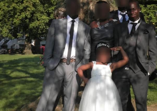 Jeffrey and his family at a wedding. Credit: Met Police