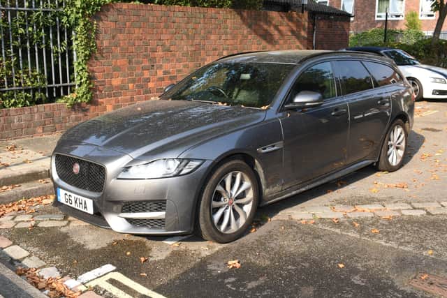 The silver Jaguar XF Estate which police says is the car which the killers were driving.  Credit: Met Police