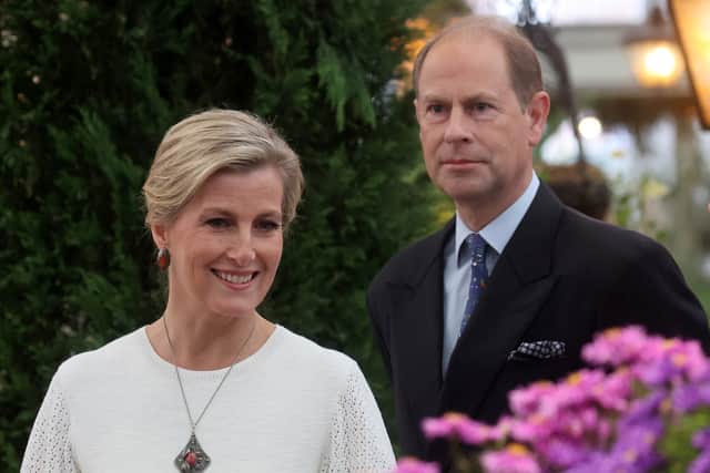 Britain’s Prince Edward, Earl of Wessex, (R) and Britain’s Sophie, Countess of Wessex react as they visit the 2021 RHS Chelsea Flower Show. Credit: CHRIS JACKSON/POOL/AFP via Getty Images