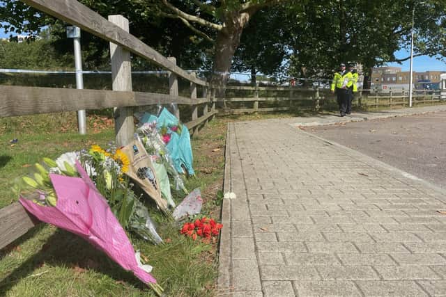 Flowers left in the south east London park where teacher Sabina Nessa was found dead, triggering a murder probe. Credit: SWNS