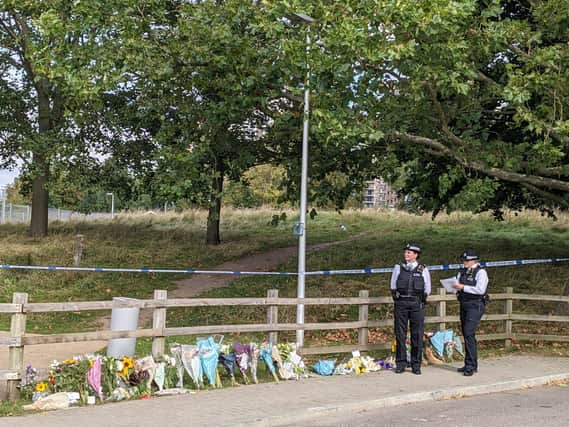 The police scene in Kidbrooke, where Sabina Nessa was killed. People have been leaving flowers in tribute. Credit: Lynn Rusk