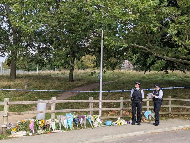 <p>The police scene in Kidbrooke, where Sabina Nessa was killed. People have been leaving flowers in tribute. Credit: Lynn Rusk</p>