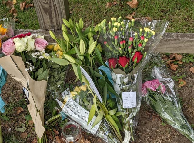Flowers left for Sabina Nessa at the scene of the crime in Cator Park, Kidbrooke. Credit: Lynn Rusk