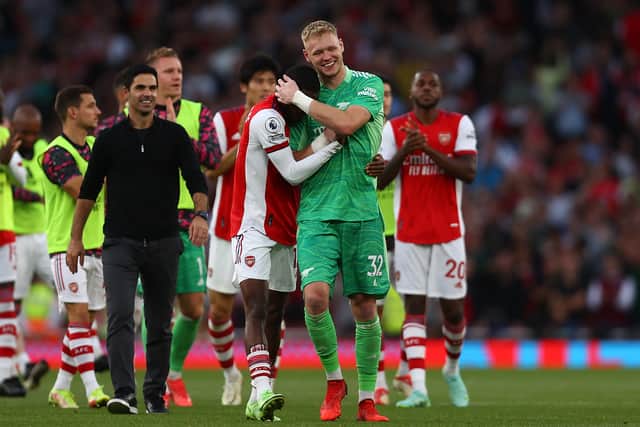 Ainsley Maitland-Niles and Aaron Ramsdale of Arsenal celebrate their side's victory (Photo by Clive Rose/Getty Images)