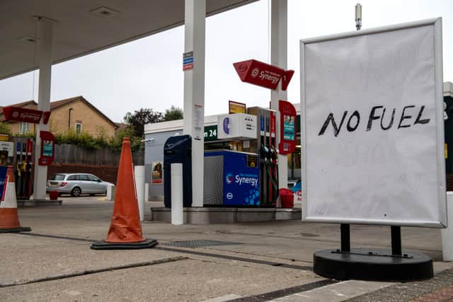 A sign outside an Esso garage informing the public that they have no fuel on September 25, 2021 in Catford, London, United Kingdom. Photo by Chris J Ratcliffe/Getty Images