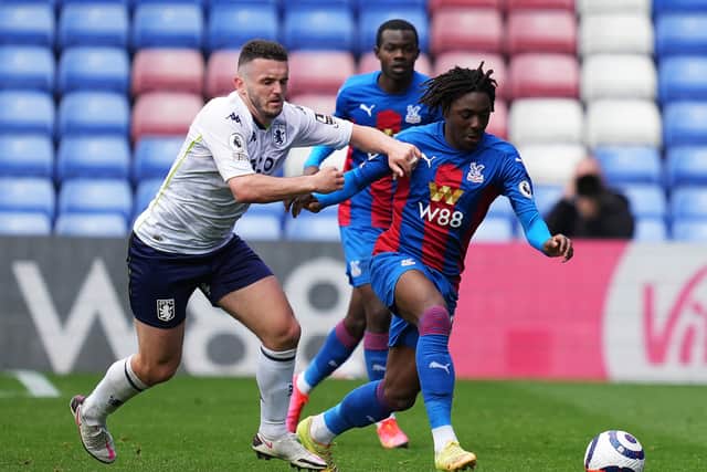 Eze of Crystal Palace is challenged by JohnÂ McGinn  (Photo by John Walton - Pool/Getty Images)