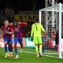 Wilfried Zaha of Crystal Palace celebrates after scoring their team's first goal during the Premier League match (Photo by Mike Hewitt/Getty Images)