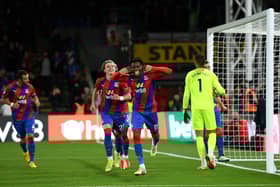 Wilfried Zaha of Crystal Palace celebrates after scoring their team's first goal during the Premier League match (Photo by Mike Hewitt/Getty Images)