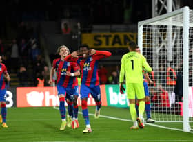 Wilfried Zaha of Crystal Palace celebrates after scoring their team's first goal during the Premier League match (Photo by Mike Hewitt/Getty Images)