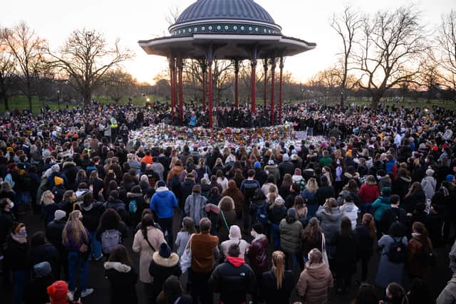 People gathered to lay flowers and pay their respects at a vigil on Clapham Common where floral tributes were placed for Sarah Everard on March 13, 2021 (image: Getty)