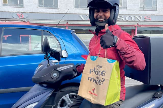 Deliveroo driver for Lily Potkin in the queue for fuel in Kingsbury, northwest London. Credit: Lily Potkin / SWNS.com