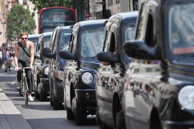 Black cabs  Credit: Getty Images