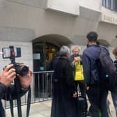Piers Corbyn (in yellow t-shirt) protests against Covid-19 measures out the court in which former Met police officer Wayne Couzens was given a full life sentence for kidnap, rape and murder of 33 year-old Sarah Everard in March. (Photo courtesy of @Anja_Popp)