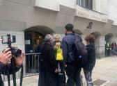 Piers Corbyn (in yellow t-shirt) protests against Covid-19 measures out the court in which former Met police officer Wayne Couzens was given a full life sentence for kidnap, rape and murder of 33 year-old Sarah Everard in March. (Photo courtesy of @Anja_Popp)