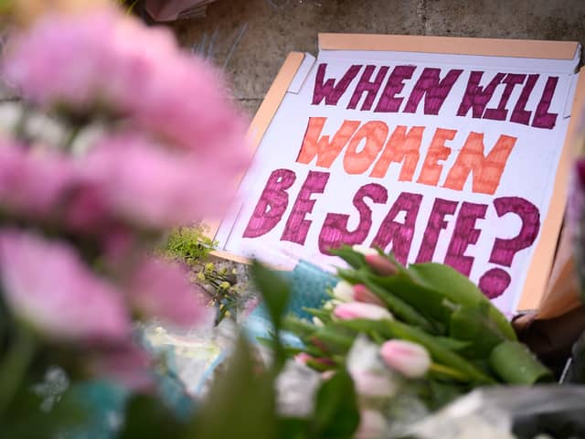 A message is seen among the flowers on Clapham Common where floral tributes were placed for Sarah Everard (Photo: Getty)