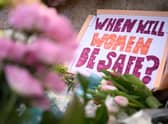 A message is seen among the flowers on Clapham Common where floral tributes were placed for Sarah Everard (Photo: Getty)