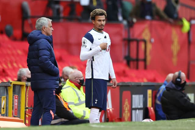 Dele Alli of Tottenham Hotspur talks to Jose Mourinho, Manager of Tottenham Hotspur as he prepares to be substituted (Photo by Carl Recine - Pool/Getty Images)