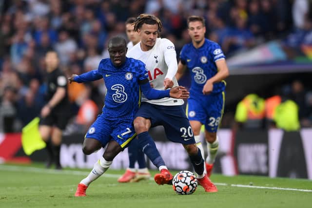Ngolo Kante of Chelsea and Dele Alli of Tottenham Hotspur battle (Photo by Laurence Griffiths/Getty Images)