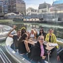 People enjoy their GoBoat trip in the Paddington Basin. Credit: Lynn Rusk