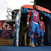 Jordan Ayew and Andros Townsend of Crystal Palace walk out prior to the Premier League match (Photo by Hannah McKay/Pool via Getty Images)
