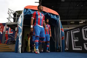 Jordan Ayew and Andros Townsend of Crystal Palace walk out prior to the Premier League match (Photo by Hannah McKay/Pool via Getty Images)