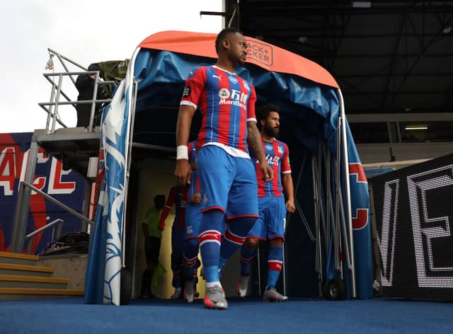 Jordan Ayew and Andros Townsend of Crystal Palace walk out prior to the Premier League match (Photo by Hannah McKay/Pool via Getty Images)