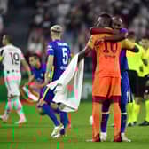 Romelu Lukaku and Edouard Mendy of Chelsea embrace prior to the UEFA Champions League (Photo by Valerio Pennicino/Getty Images)