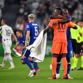 Romelu Lukaku and Edouard Mendy of Chelsea embrace prior to the UEFA Champions League (Photo by Valerio Pennicino/Getty Images)